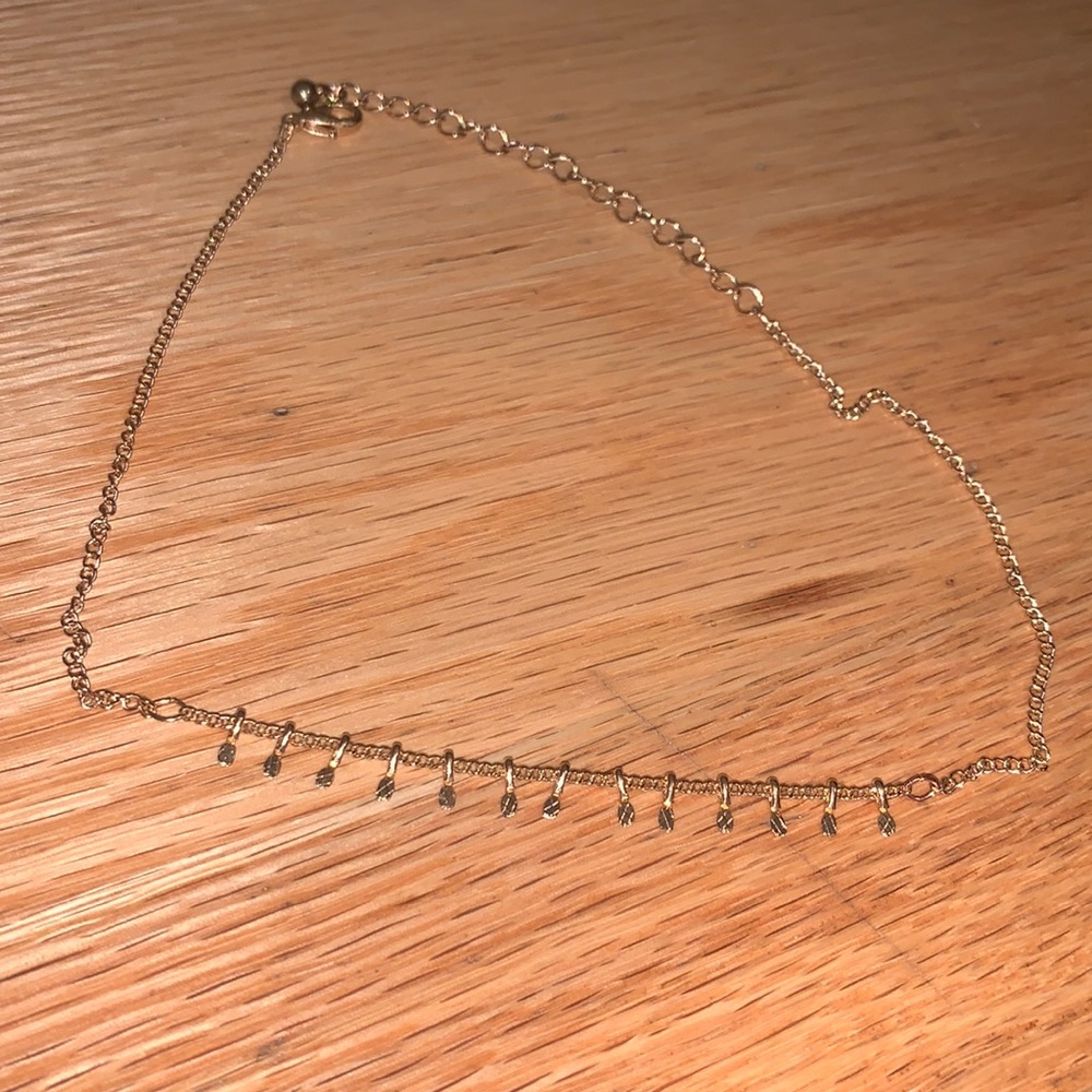 Gold choker with small dangles